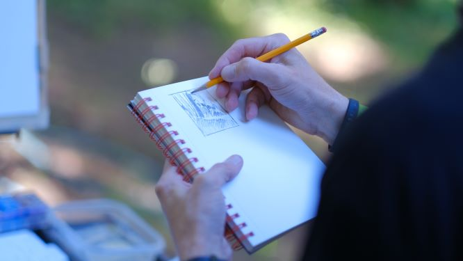Artist sketching a scenery