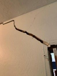 Foundation damage, wall crack, structural issue, interior damage, ceiling crack, repair needed, home maintenance