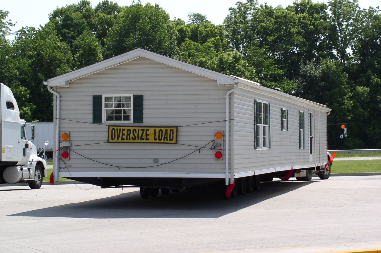 Mobile home on a trailer with 