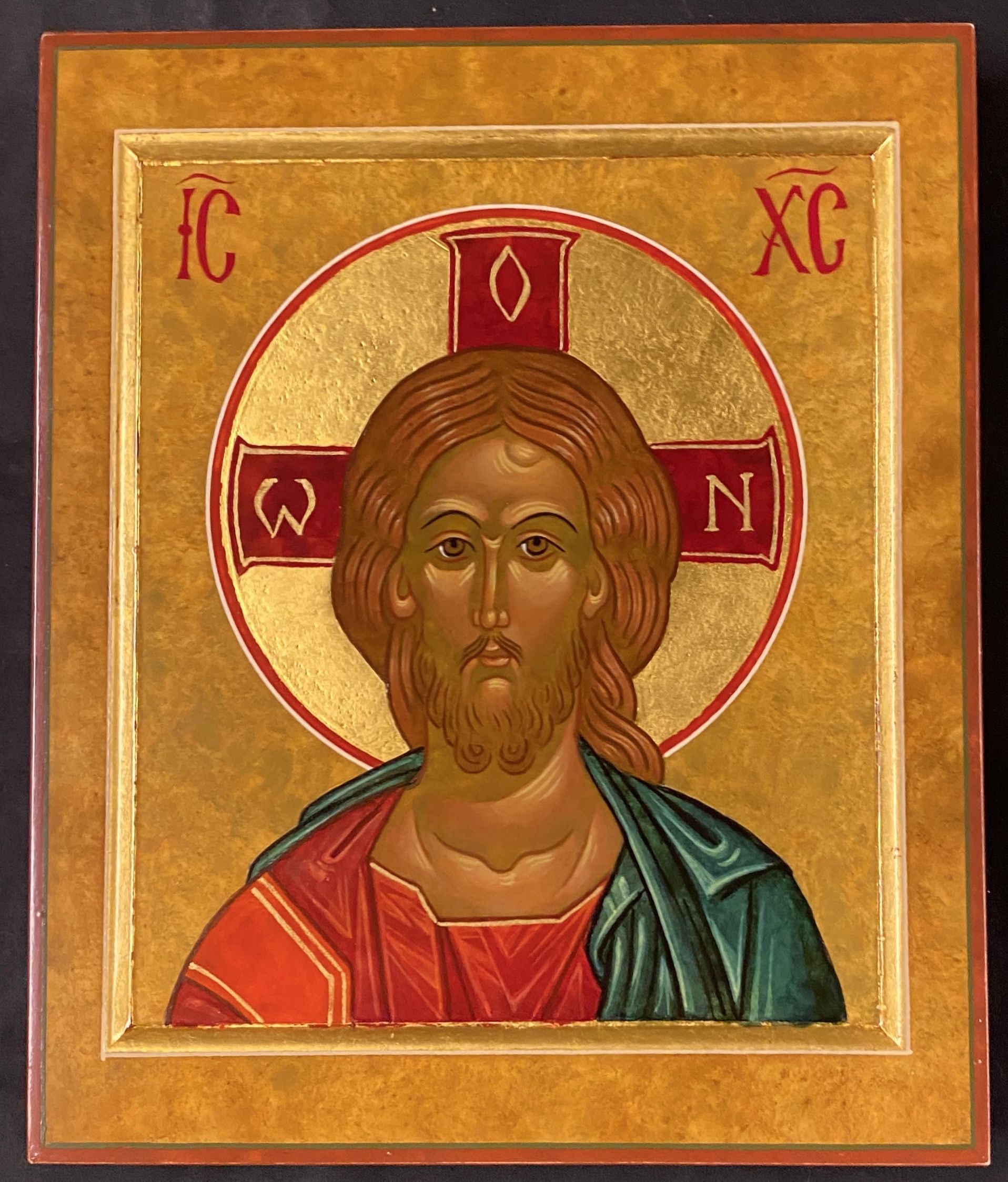 An icon of jesus with the letters ic and xc on it