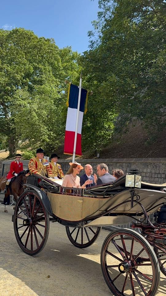 Prince William and Catherine in a carriage during a state visit in Windsor