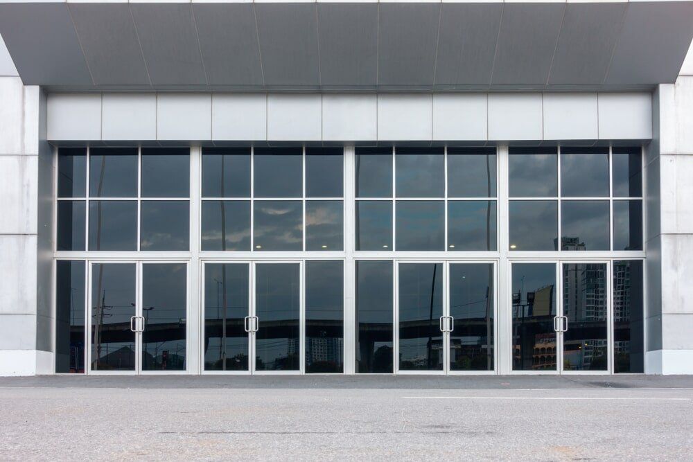 Commercial Building Glass Doors — Glass & Aluminium in Smithfield, QLD