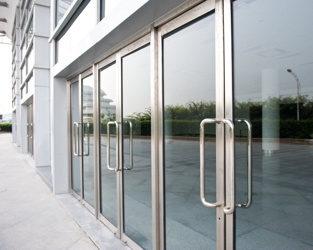 Glass Doors With Large Handles — Glaziers in Smithfield, QLD