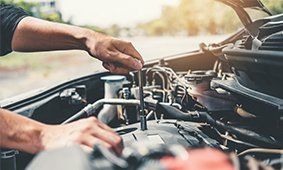 Mechanic Working in Auto Repair Service — Huntington Beach, CA — Britton's Automotive