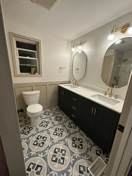 Luxury bathroom remodel with walk-in shower and floating vanity