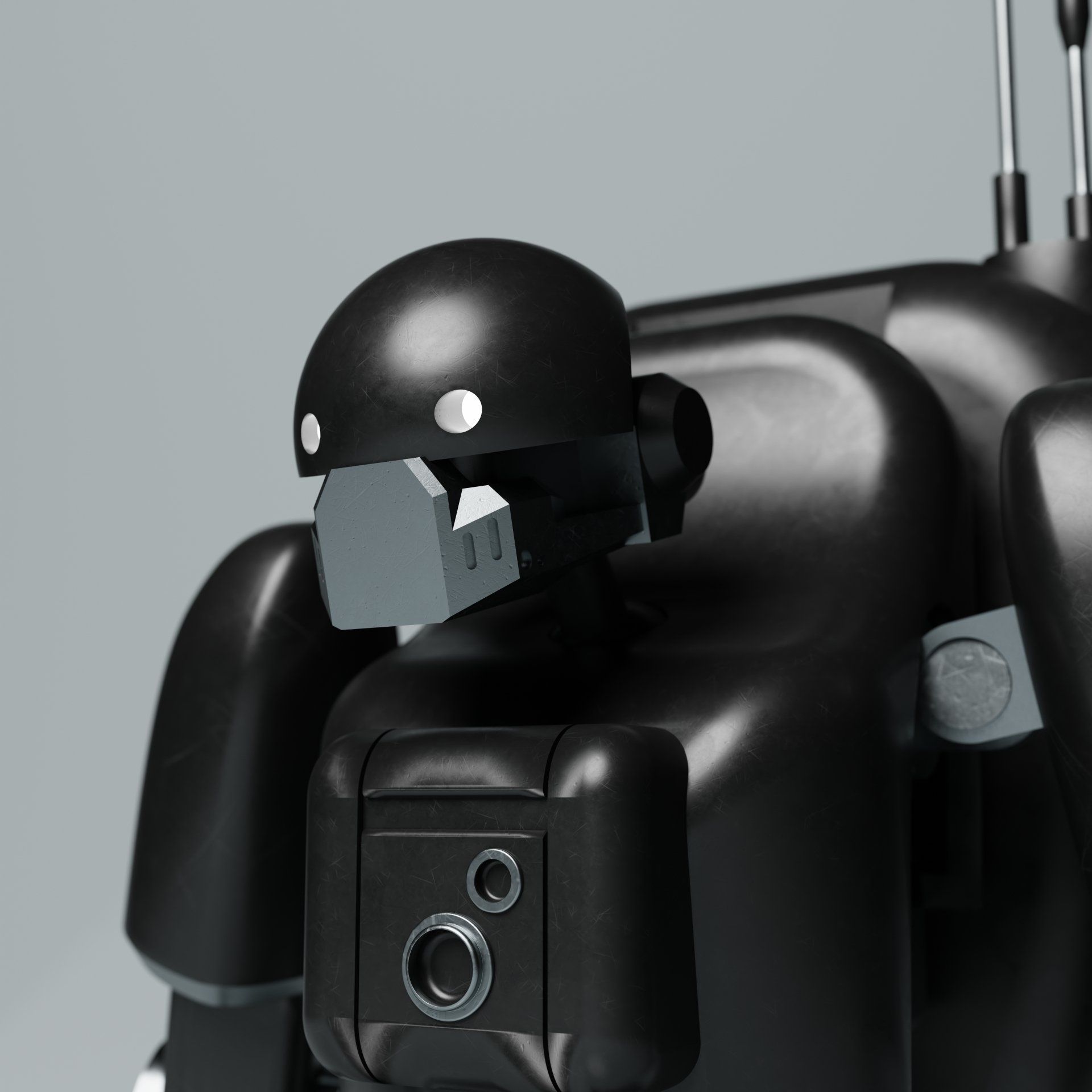 A close up of a black robot with a helmet on