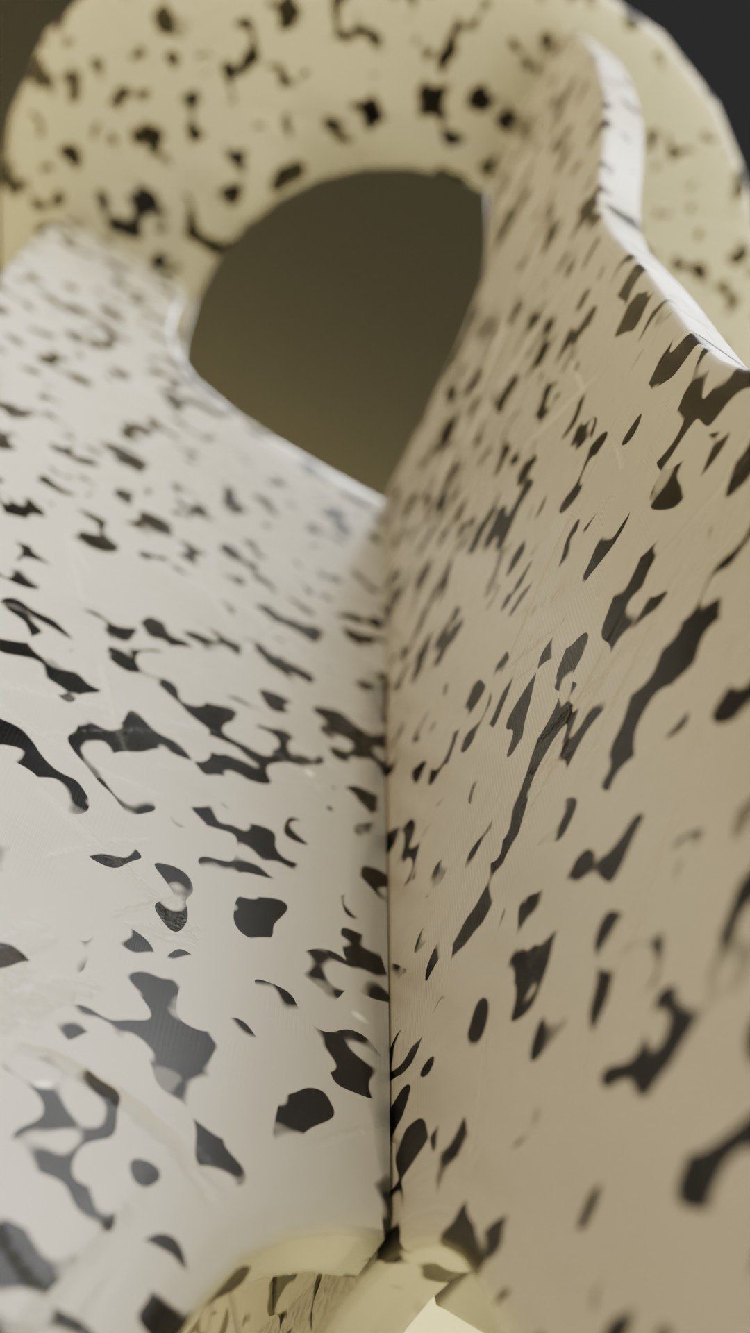 A close up of a piece of paper with black spots on it