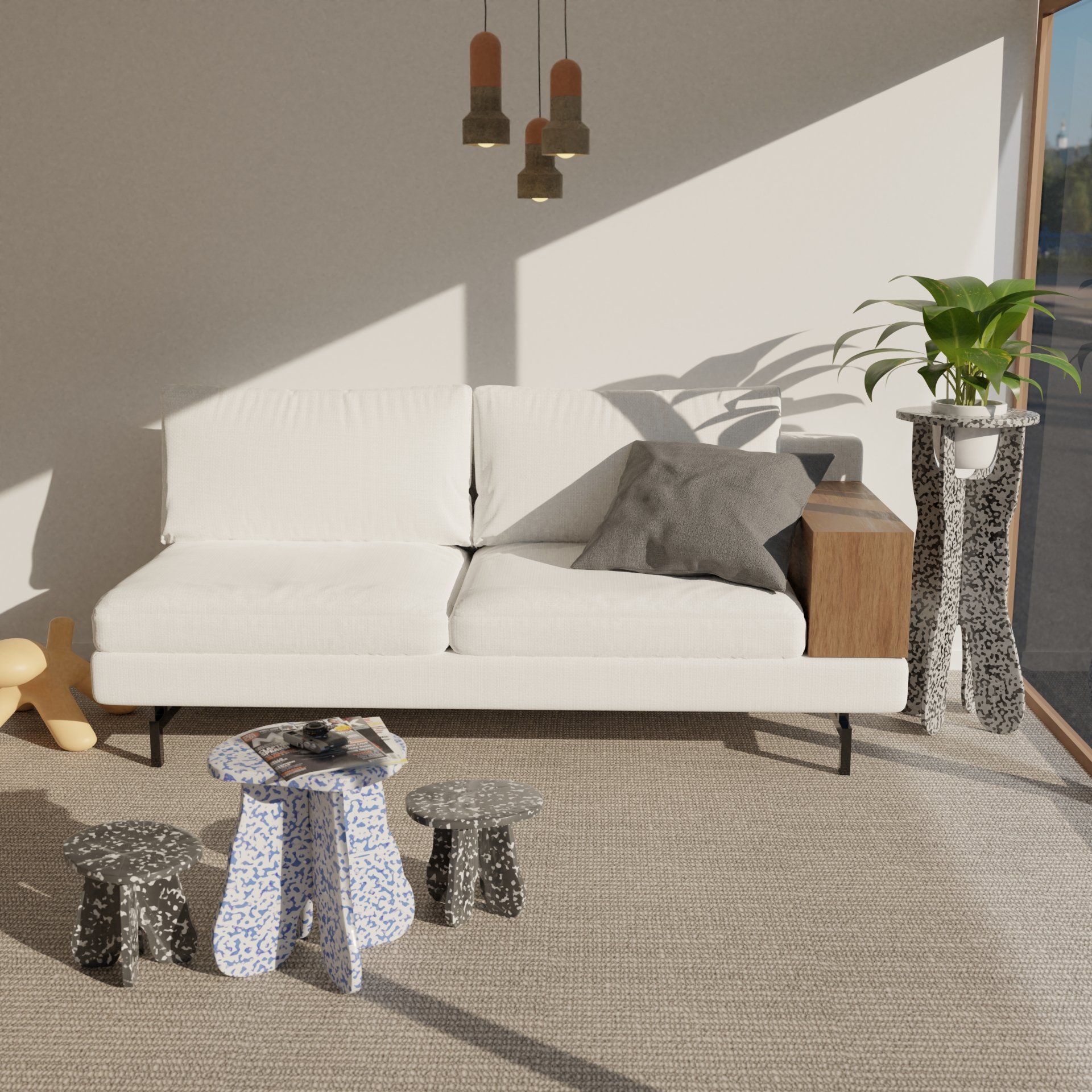 A living room with a white couch and two tables