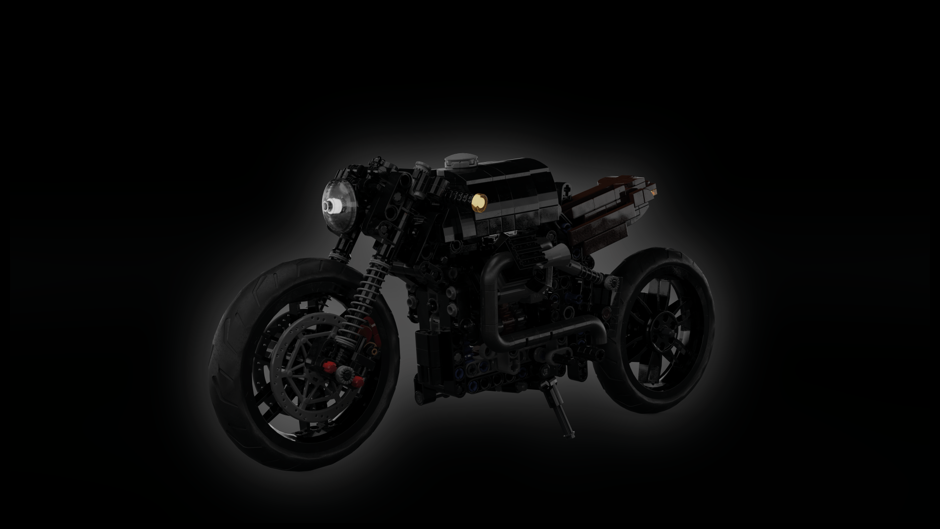 A black motorcycle is sitting on a black background.