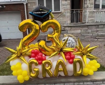 Graduation balloon marquee. Red, gold and white. Congrats 2023 grad!