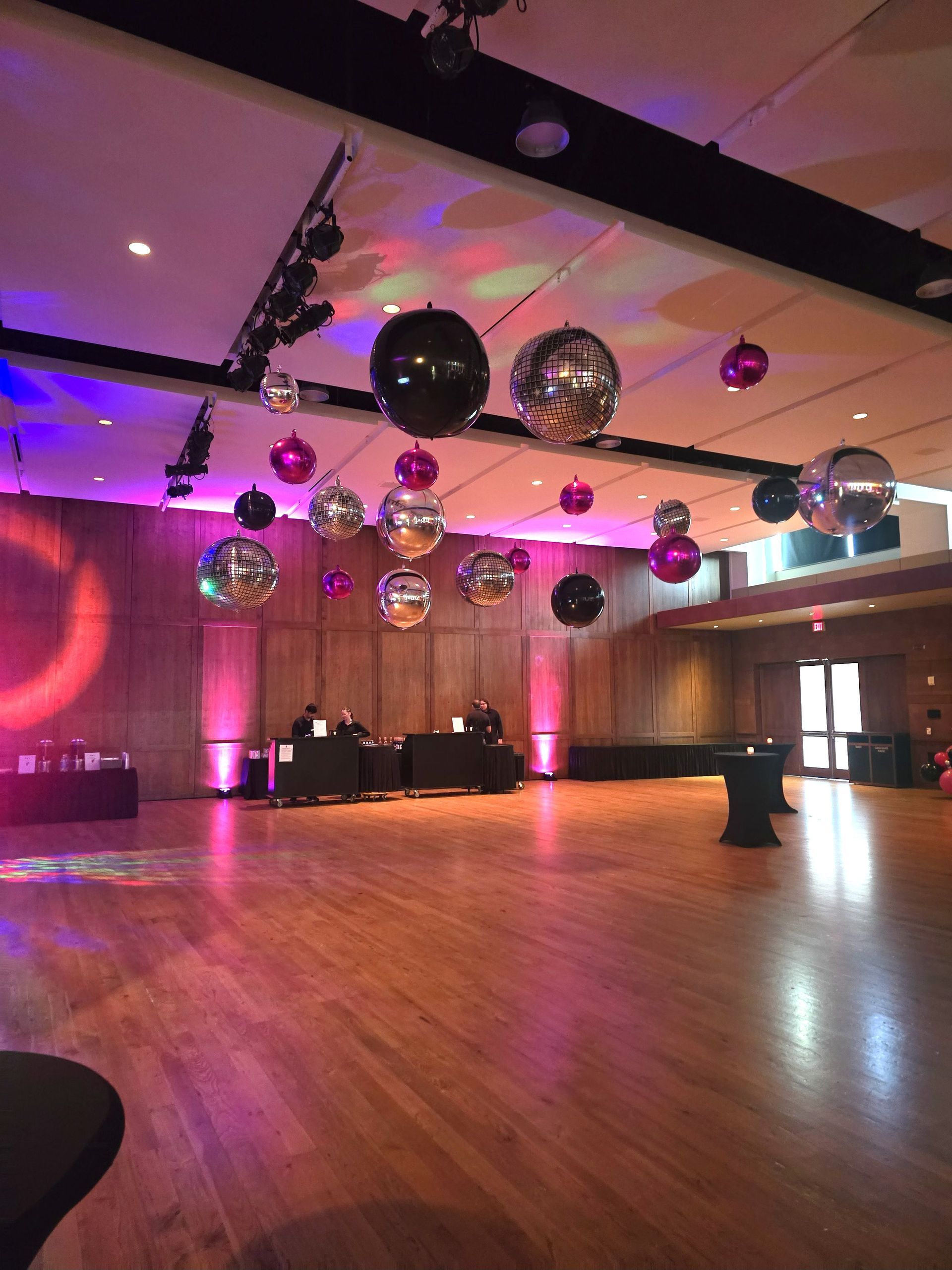 Ceiling Orbs and Disco Balls. Black and pink orbs. Silver disco balls.