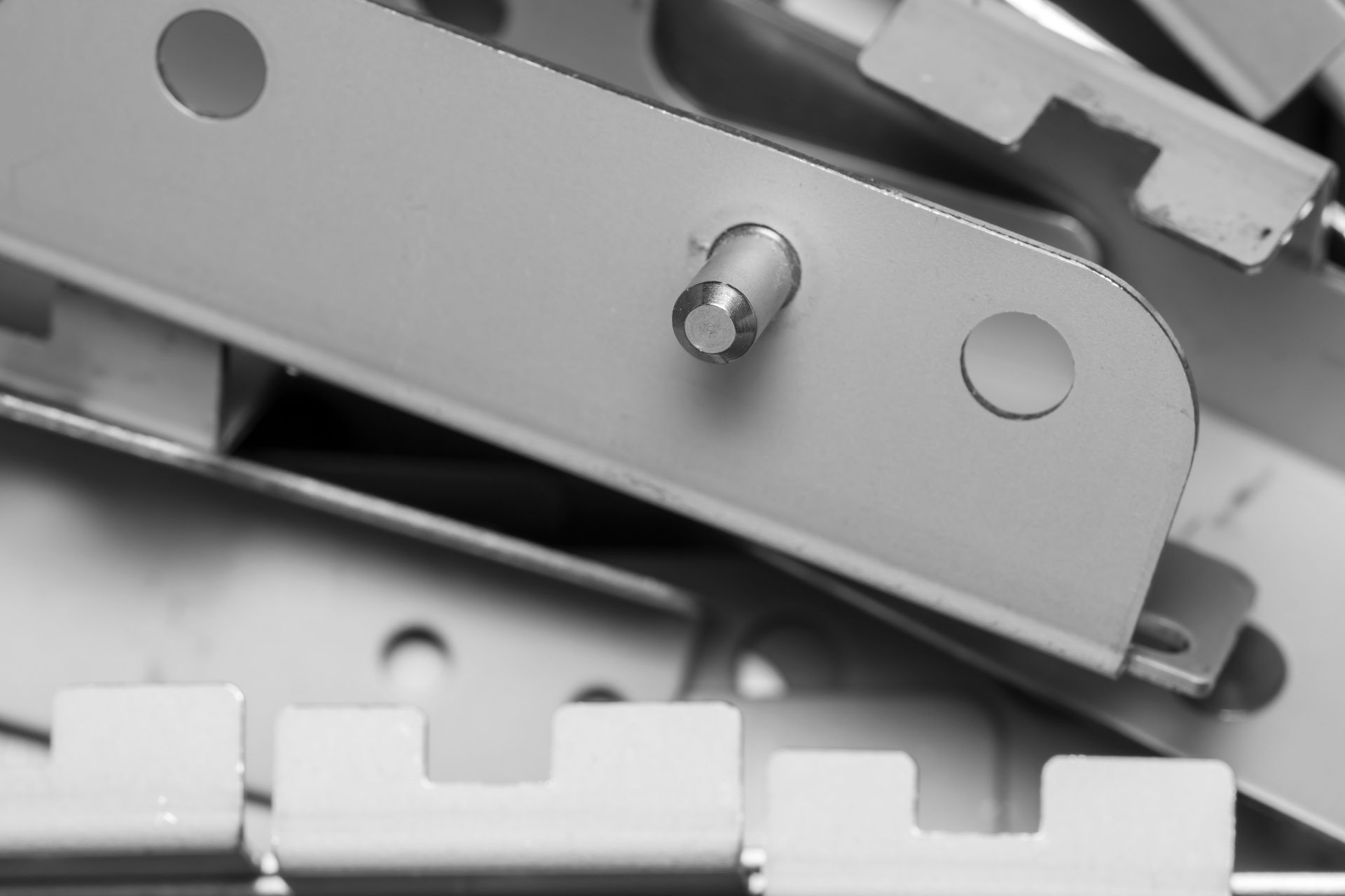 A bunch of metal pieces are stacked on top of each other.