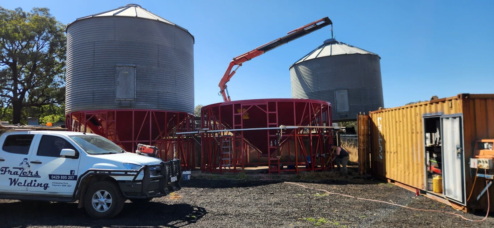 A White Truck is Parked in Front of a Building Under Construction — Welders In Gilgandra, NSW