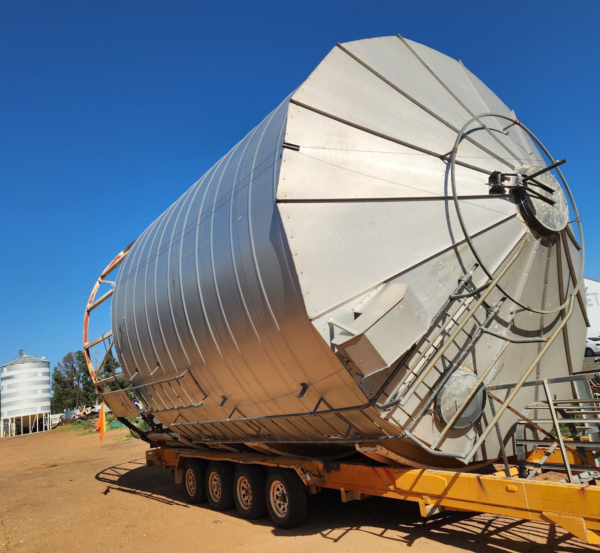 A Large Stainless Steel Silo is on a Trailer — Welders In Gilgandra, NSW