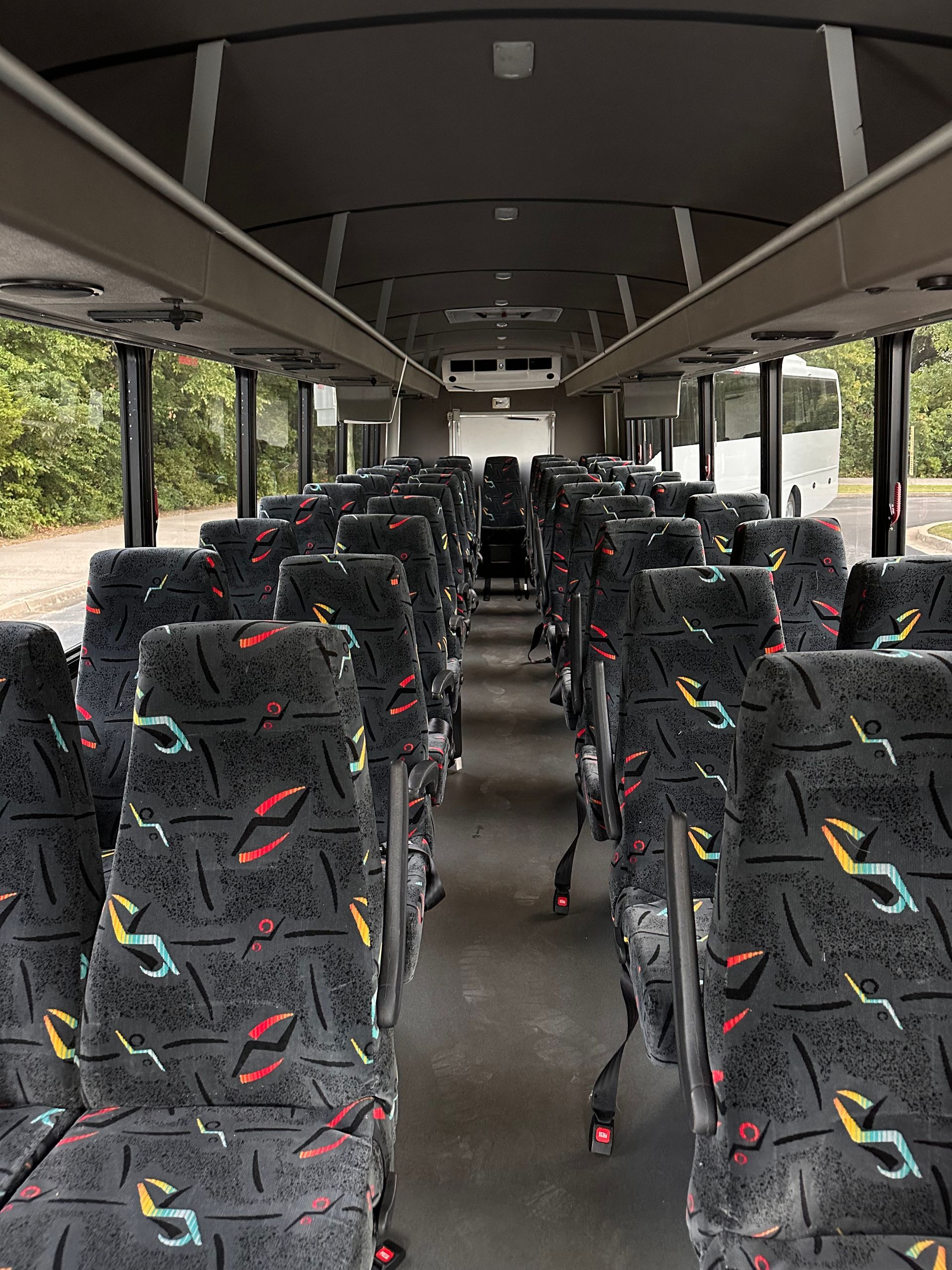 Shuttle turning into venue access road