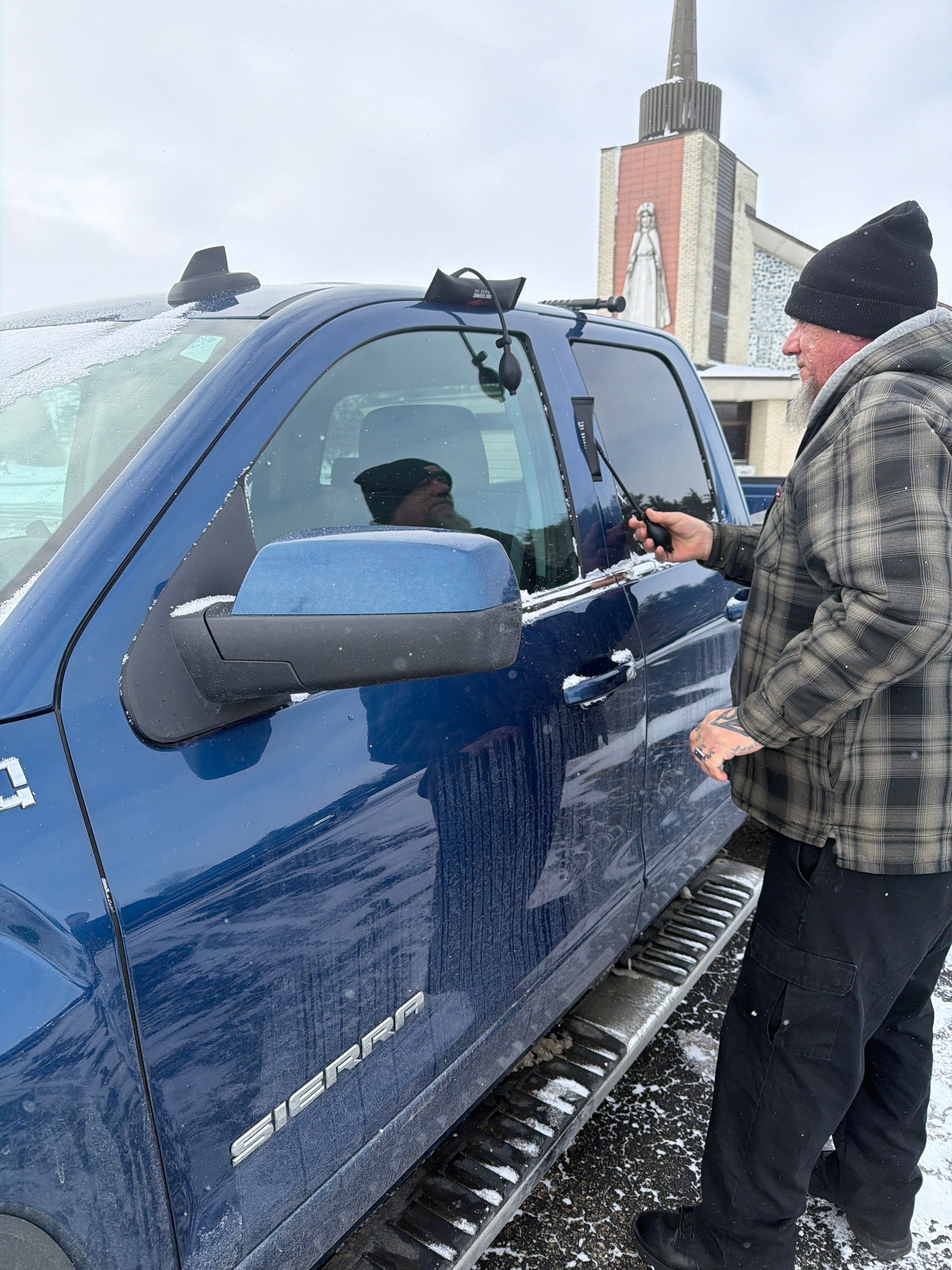 mike using our lockout tools to unlock the vehicle
