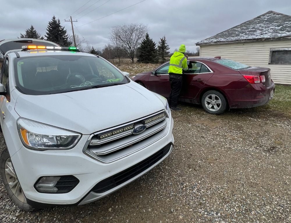 unlocking a car door to retrieve keys