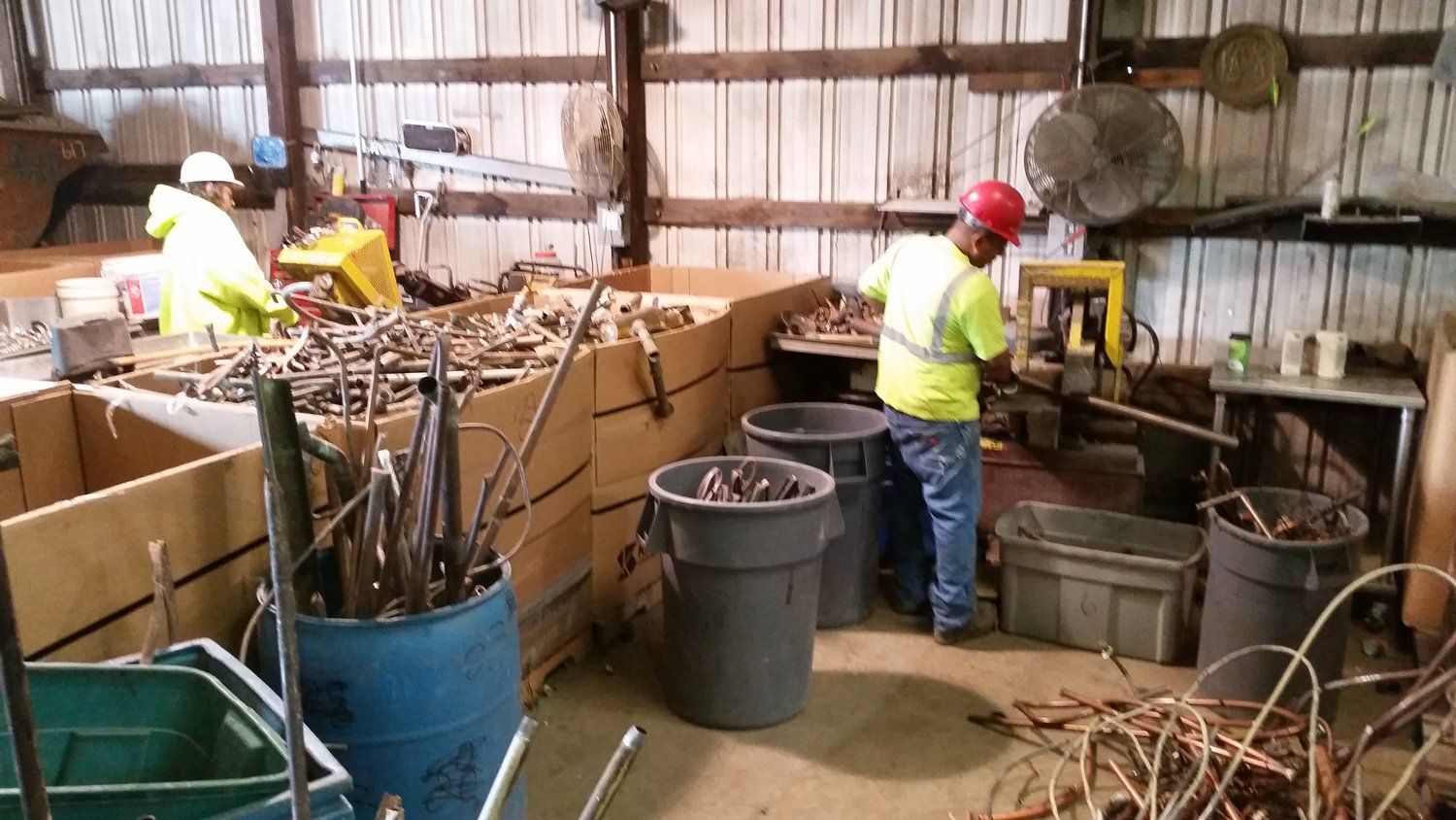 Workers Sorting Ferrous And Non-Ferrous Metals — Freehold, NJ — Beacon Scrap Iron and Metal Co.