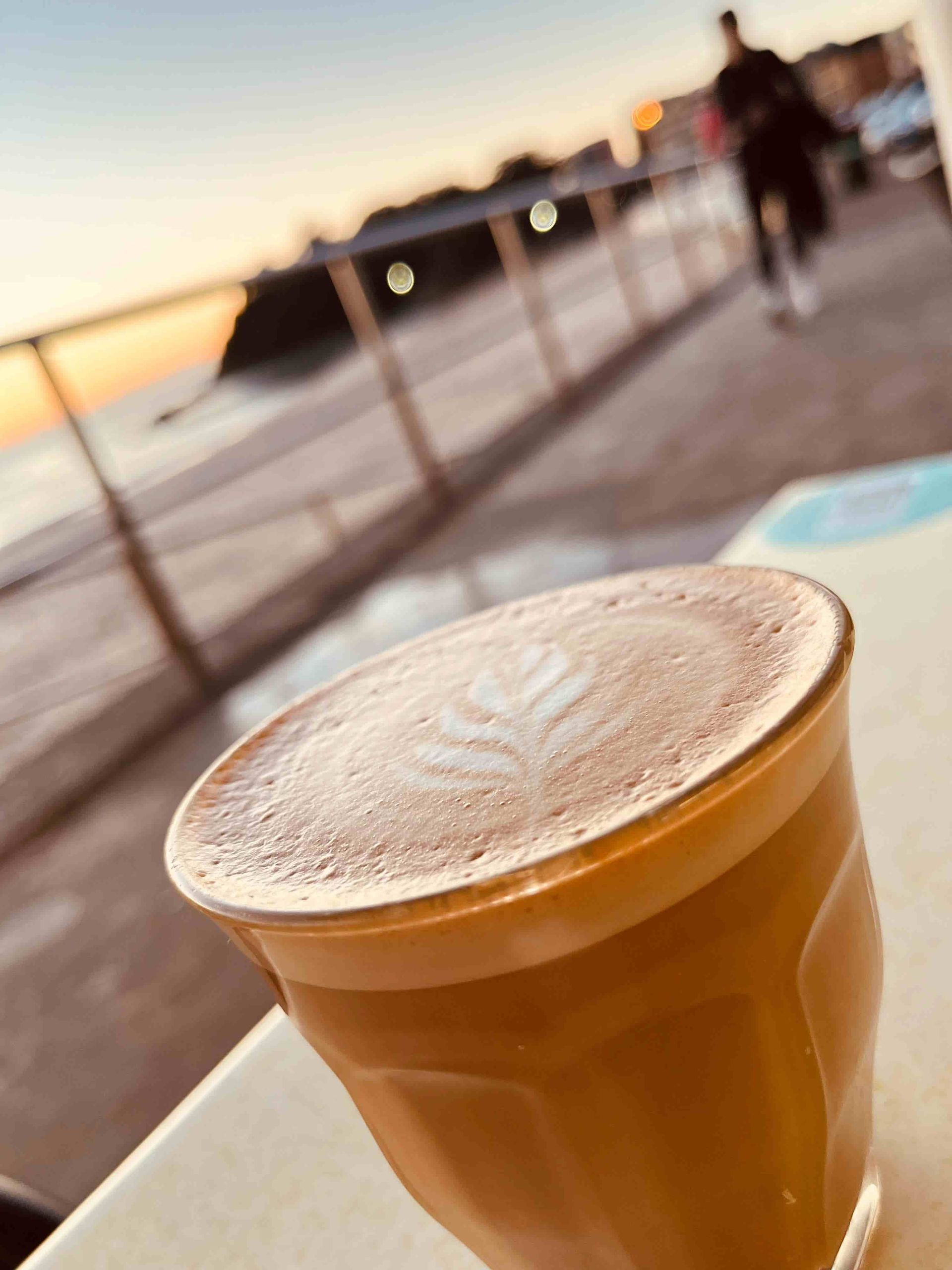 A Cup Of Coffee On A Table — Beach Bums Cafe In Forster, NSW