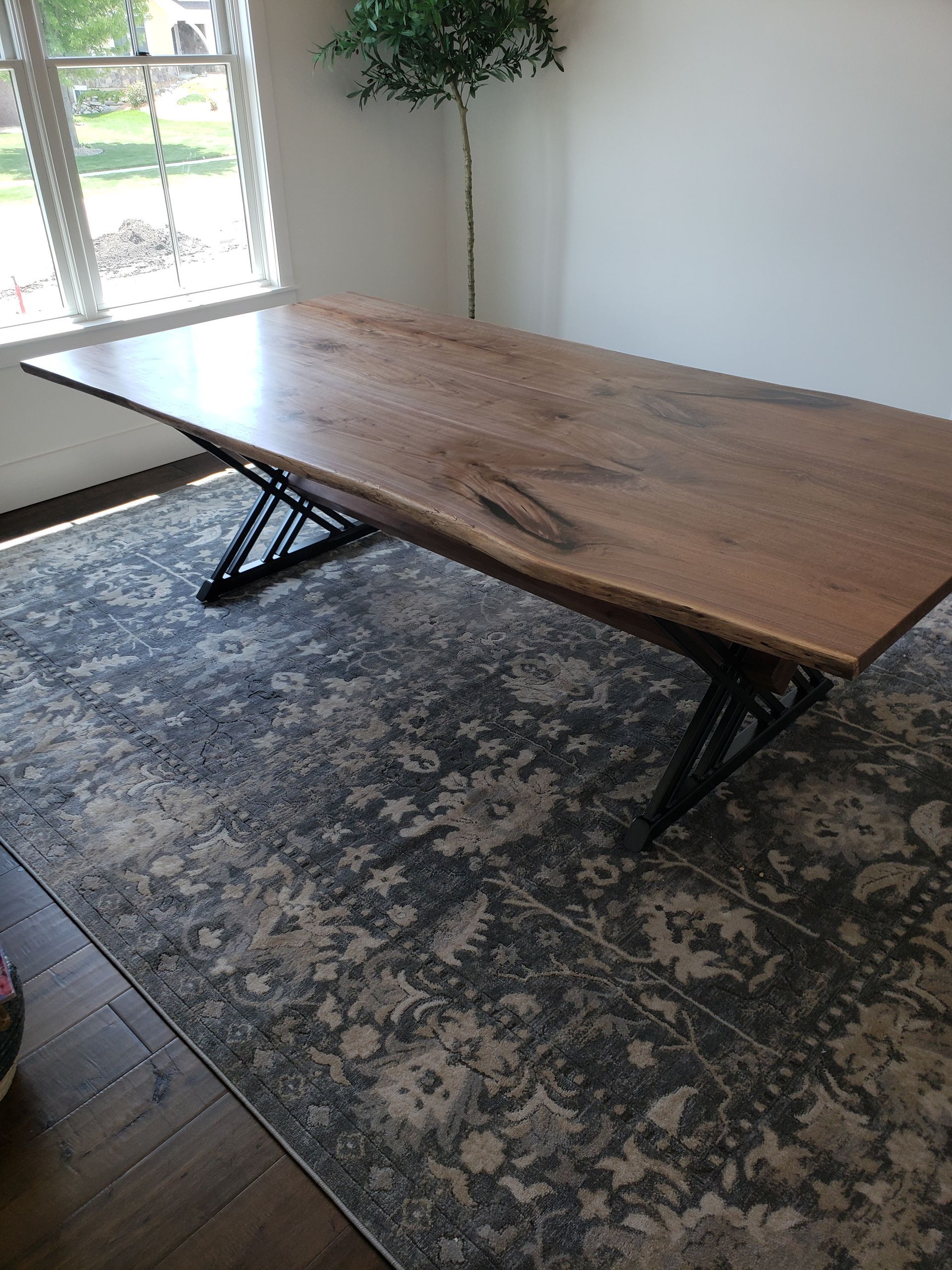Custom built table with metal trestle