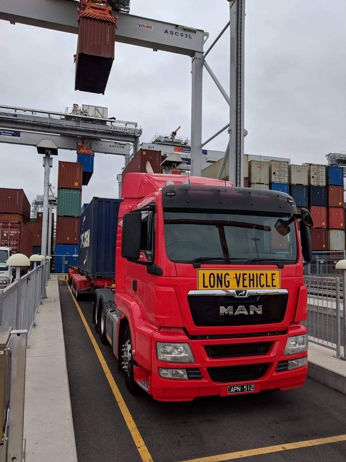 men standing with logistic truck