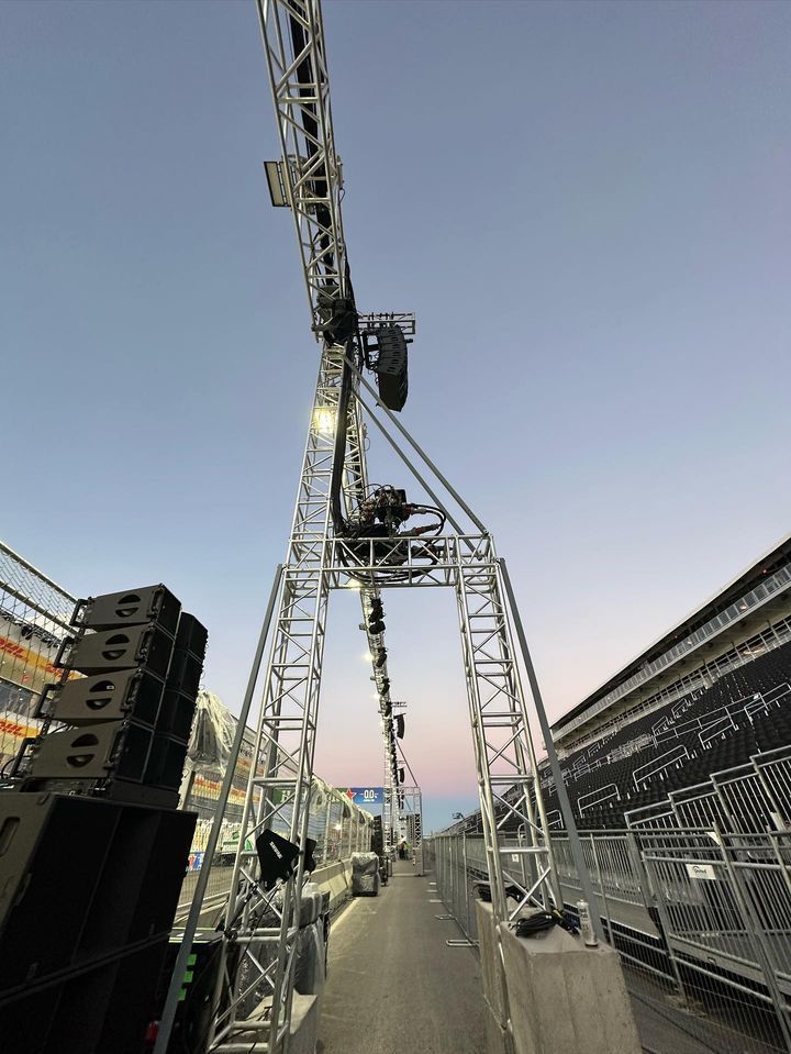 A large metal structure with speakers attached to it