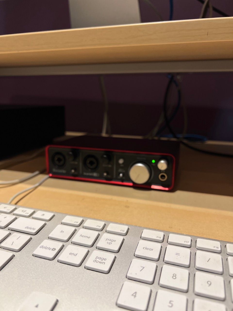 A keyboard and a sound card on a desk