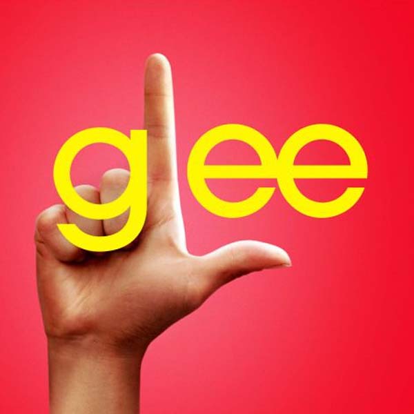 A hand is pointing up at the glee logo