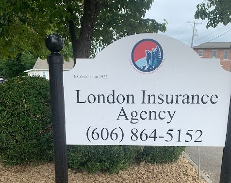 Sign for London Insurance Agency with phone number