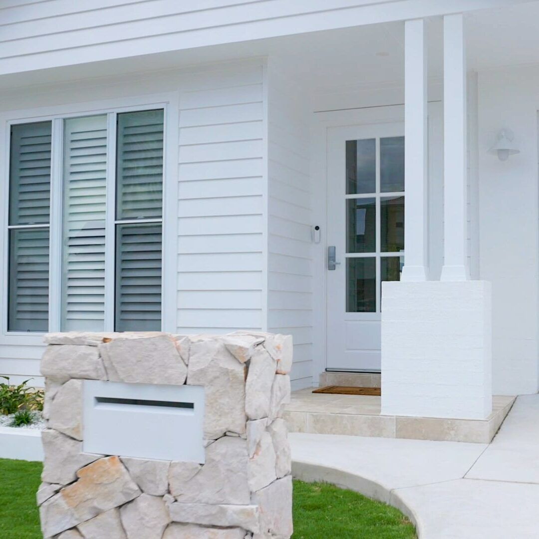 A White House With a Stone Mailbox in Front of It— Evolution Building Group Dapto, NSW