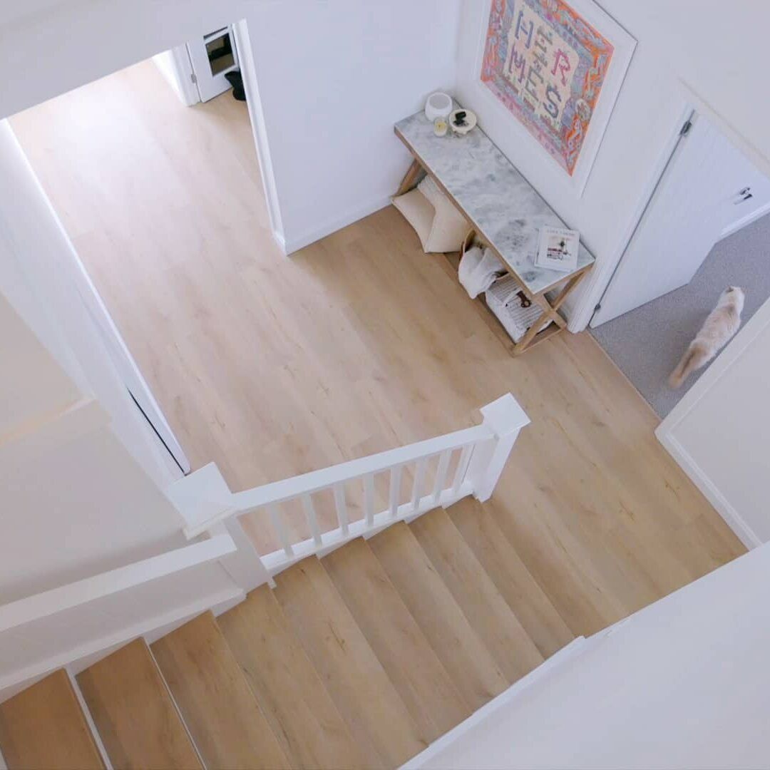 An Aerial View of a Wooden Staircase With a White Railing — Evolution Building Group Dapto, NSW