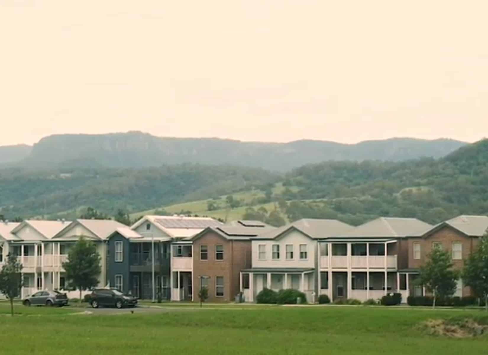 A Row of Houses With Mountains in the Background — Evolution Building Group Dapto, NSW