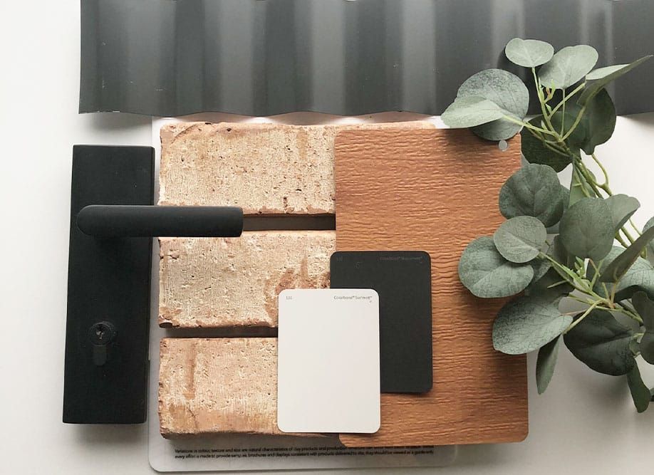 There Are Many Different Types of Materials and a Plant on the Table — Evolution Building Group Dapto, NSW