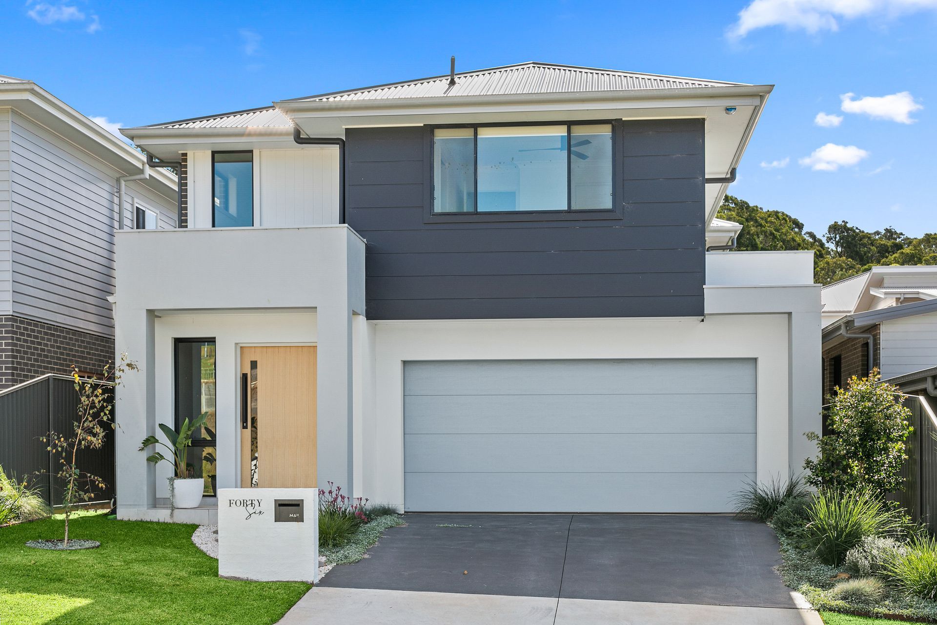 New house with number fourty six written on letter box — Evolution Building Group In Appin, NSW