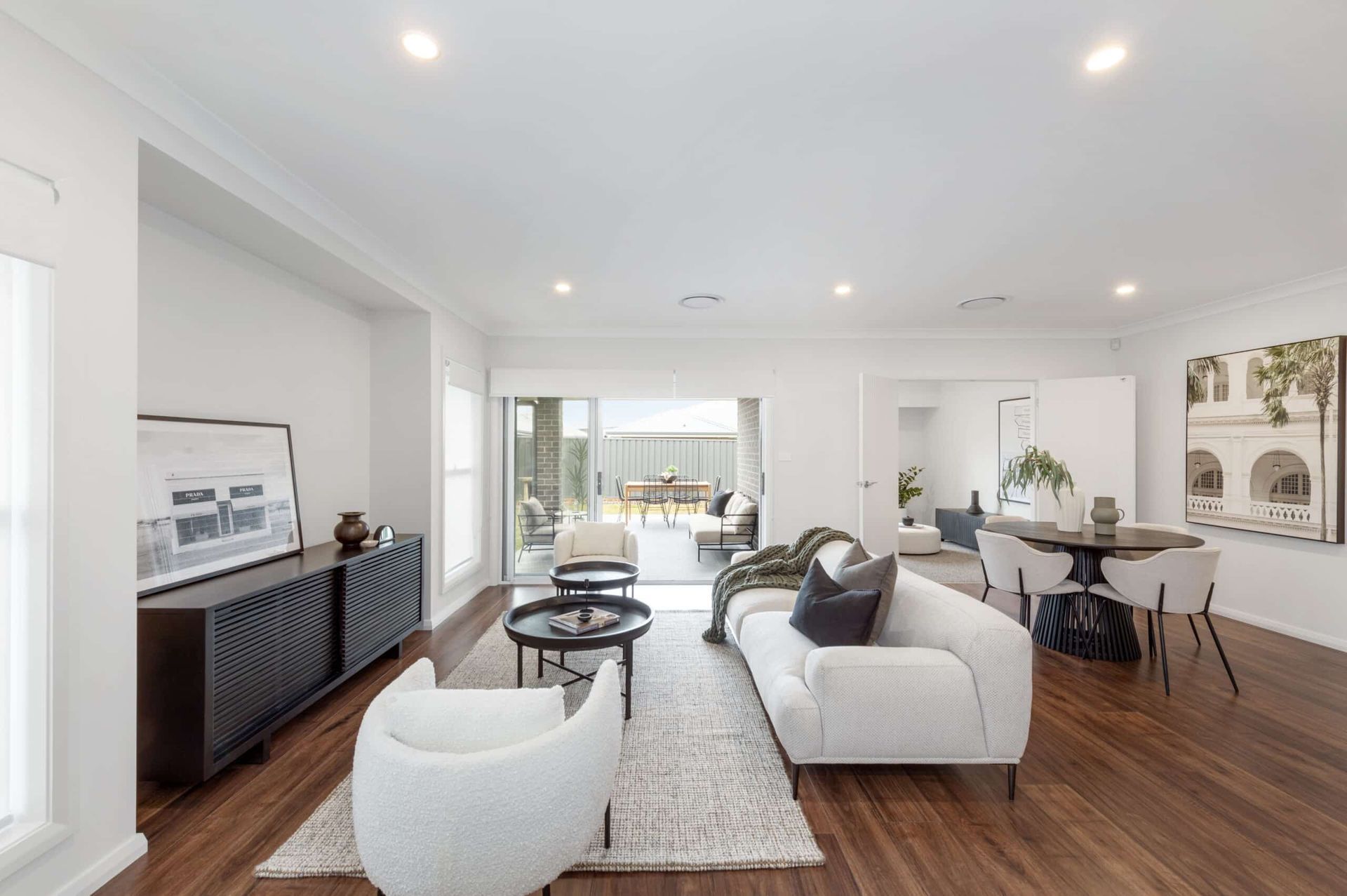 A Living Room With a Couch, Chairs, and a Table — Evolution Building Group Dapto, NSW