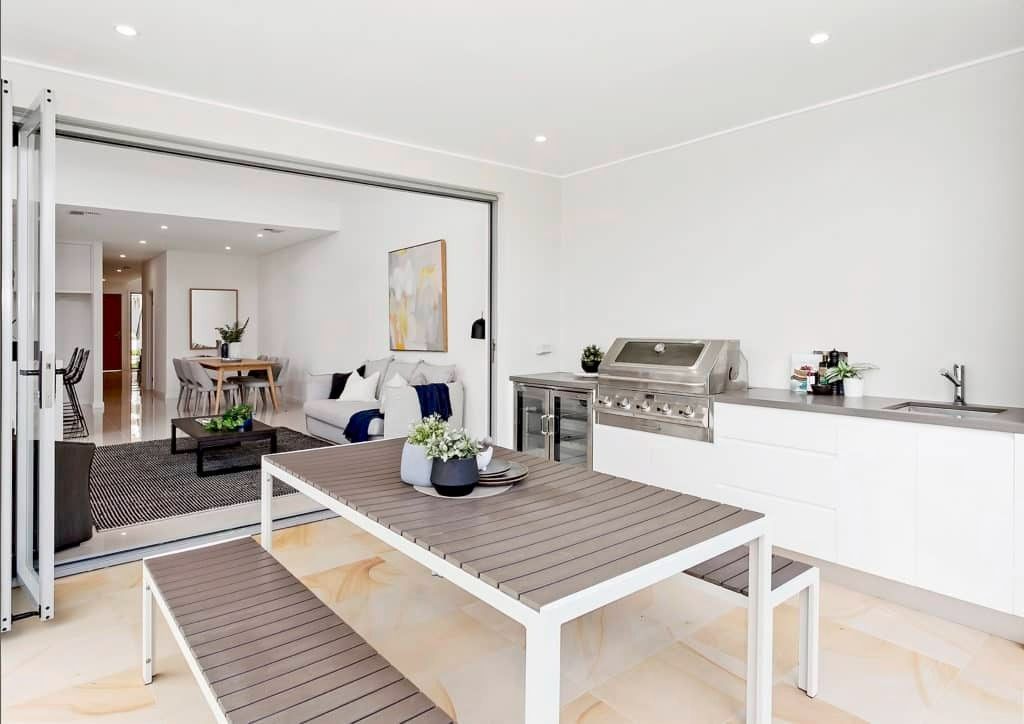 There is a Table and Bench in the Middle of the Room — Evolution Building Group Dapto, NSW