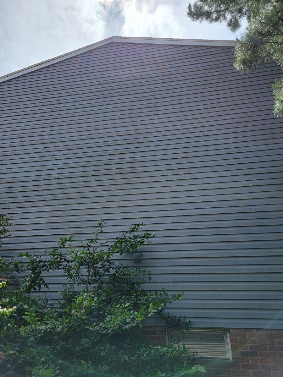 Gray Vinyl Siding House Before — Canton, OH — Big T's Power Clean