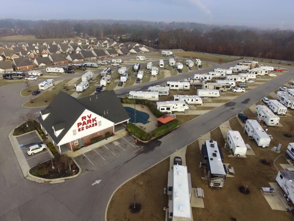 An aerial view of a rv park with a lot of rvs