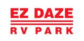 A red and white logo for ez daze rv park.