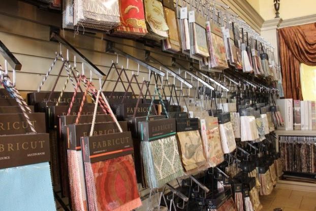 A Display Of Fabrics And Curtains With Nice Packaging — San Antonio, TX — Arrow Upholstery & Drapery