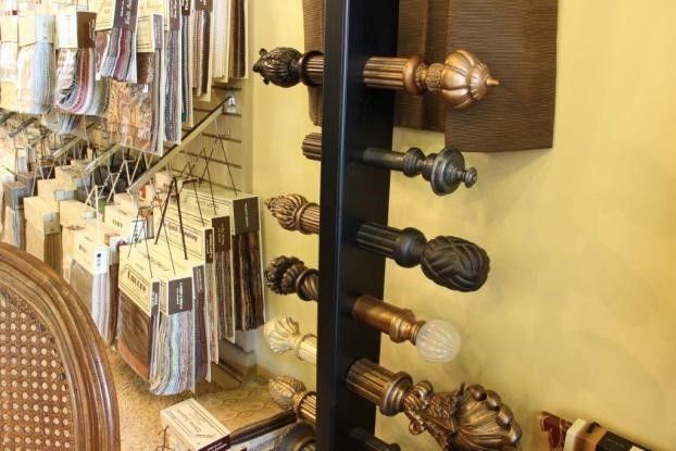 A Display Of Curtain Poles In A Store — San Antonio, TX — Arrow Upholstery & Drapery 