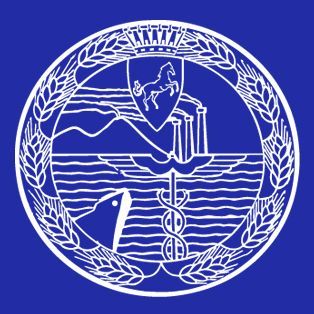 Blue and white circular emblem: horse, buildings, snake, mountains, water, wheat; possibly a city seal.