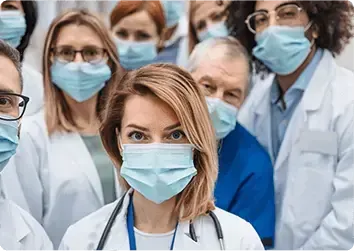 Group of masked medical professionals; doctors and nurses.
