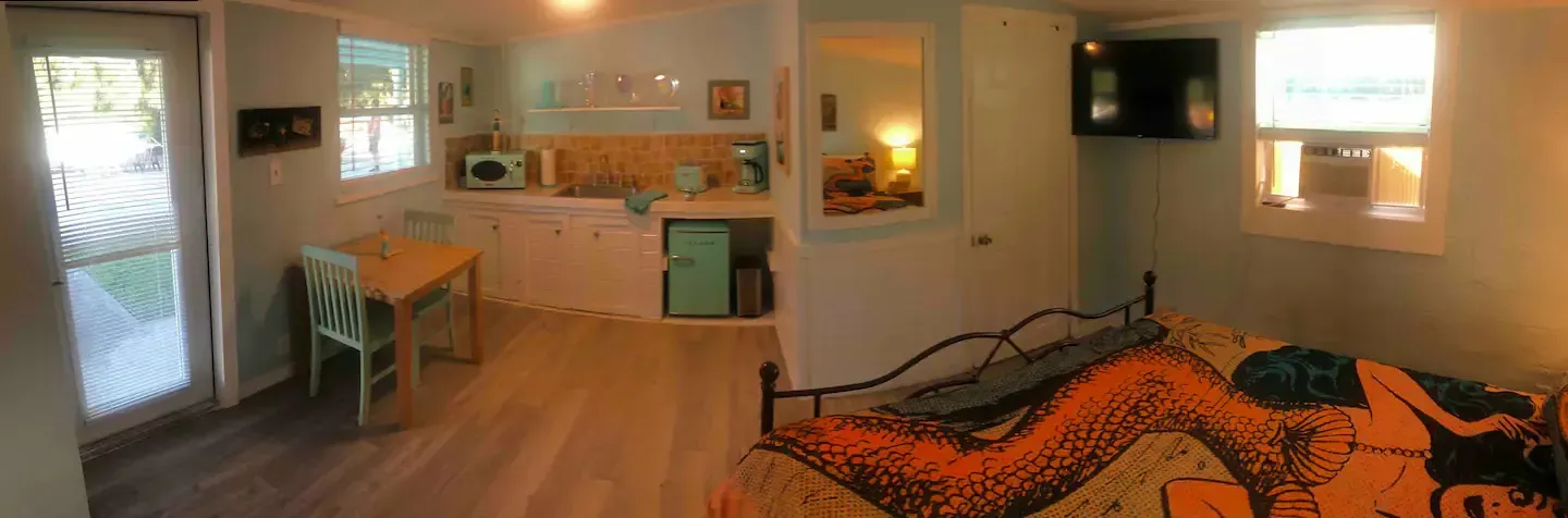 There is a bed in the middle of the room.