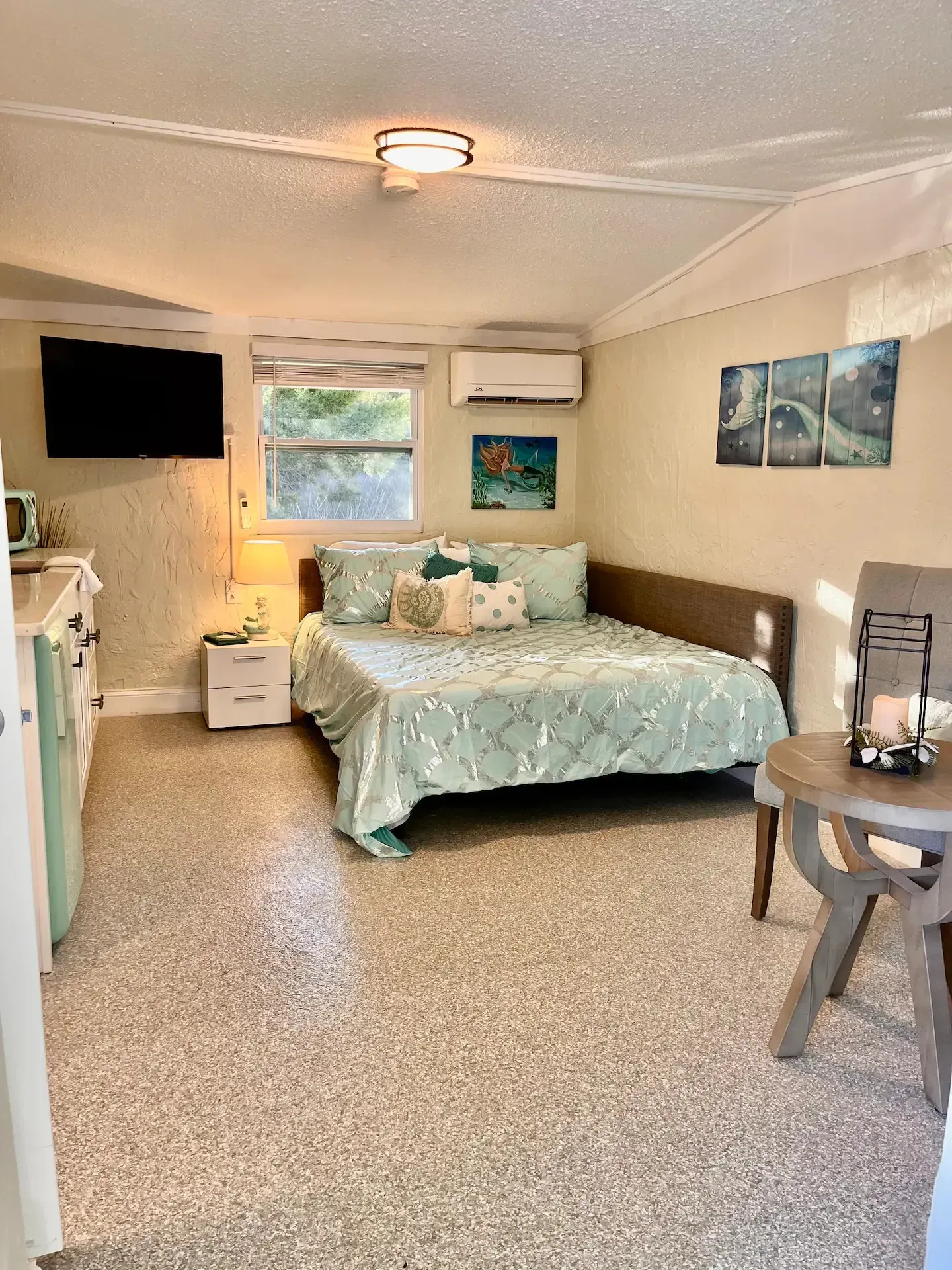 There is a large bed in the middle of the room.