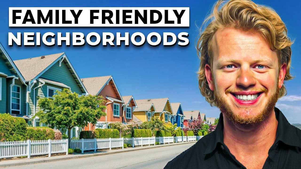 Blond man smiles in front of colorful houses, text reads 