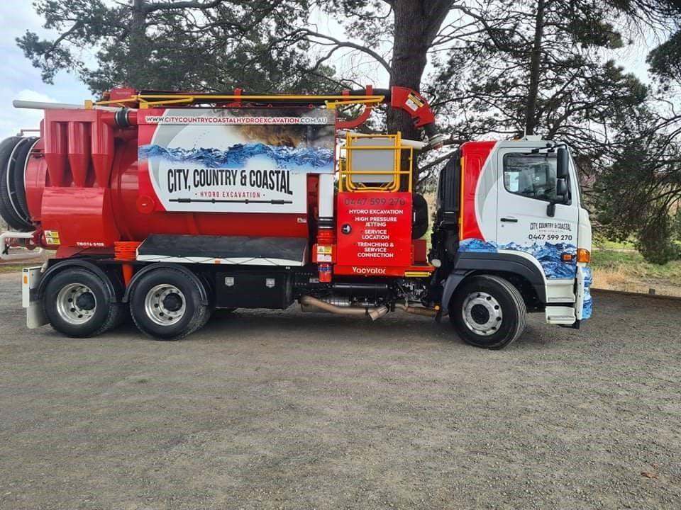 A city country and coastal vacuum truck is parked in a parking lot — Hydro Excavation in Goulburn, NSW