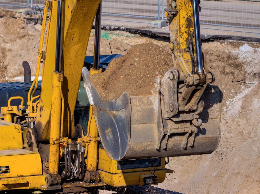 Excavator Bucket With Soil, Earthworks — Hydro Excavation in Goulburn, NSW
