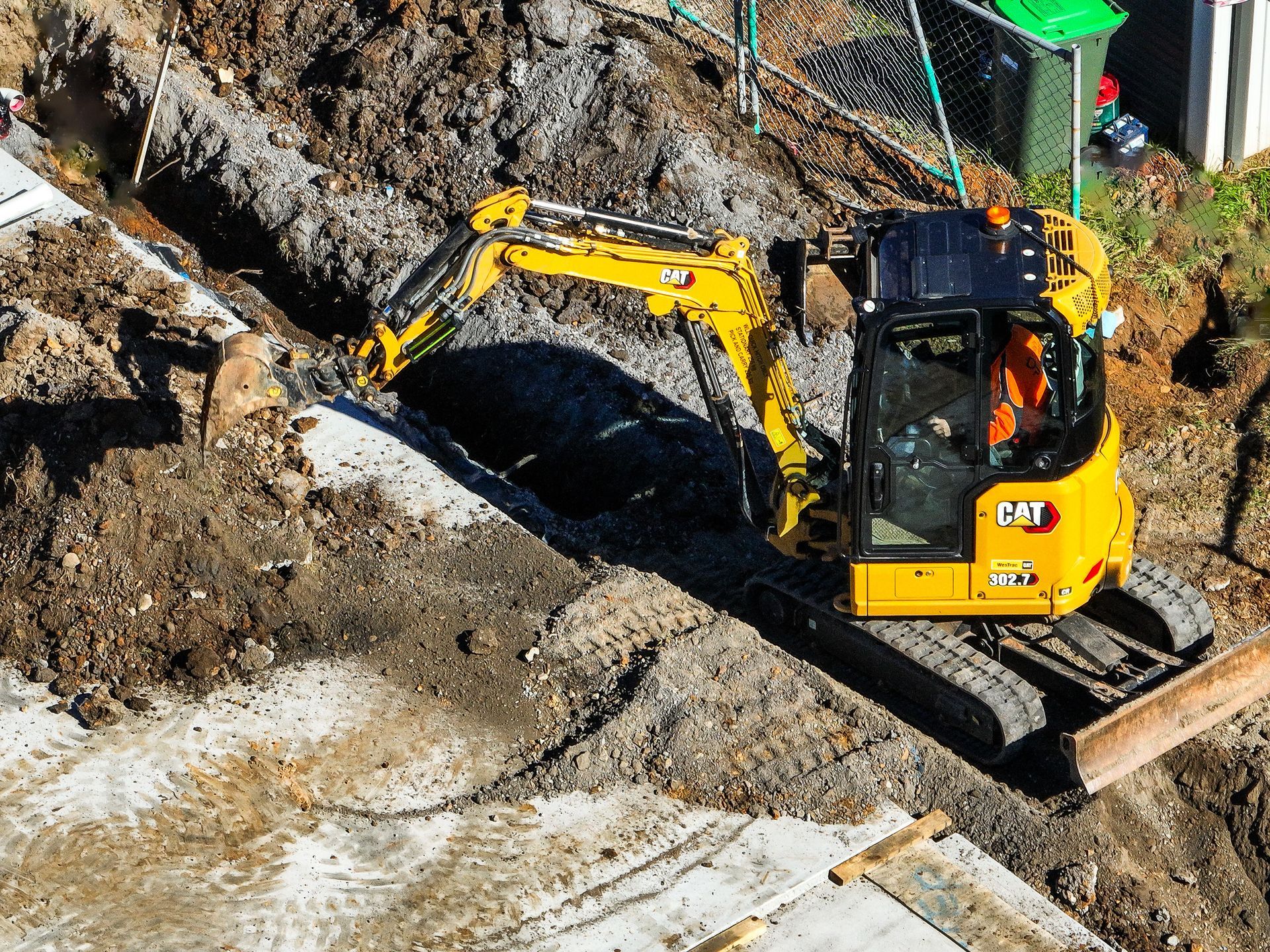 Working on the excavation machine and working on a construction site — Hydro Excavation in Goulburn, NSW