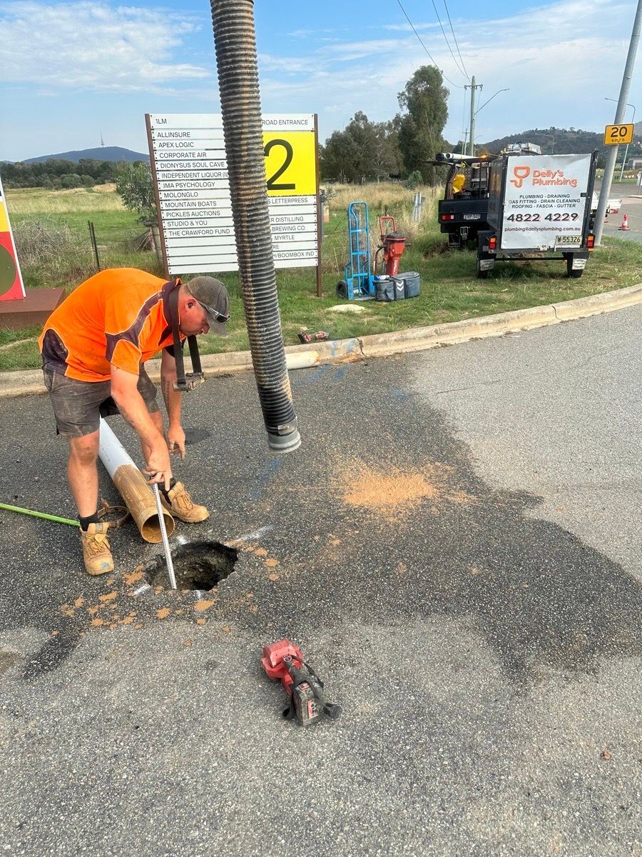 A man using a GPR to locate a pothole in the road — Hydro Excavation in Goulburn, NSW